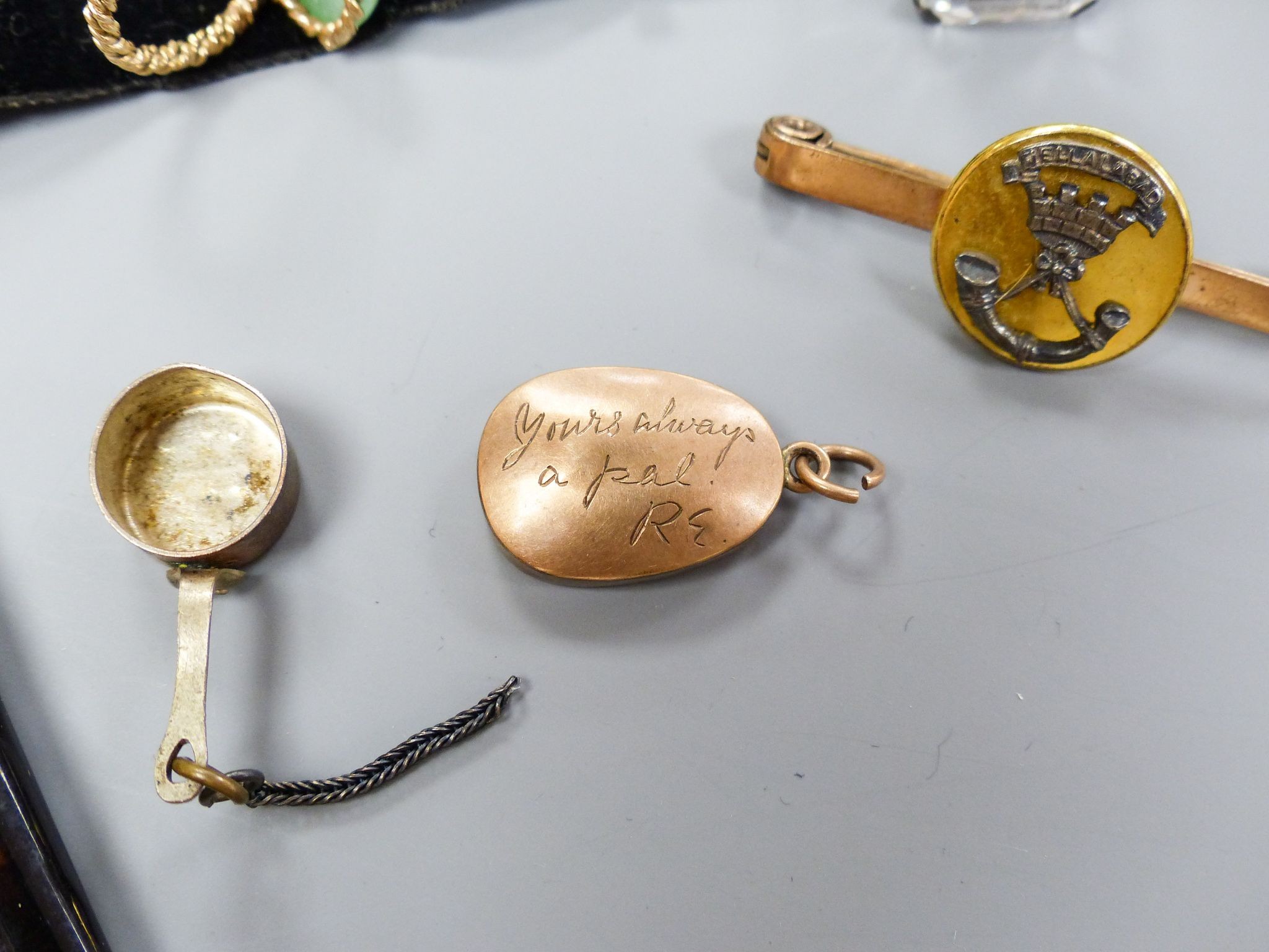 Minor jewellery including a white metal and white paste set dress ring, one other two stone ring, a bar brooch etc.